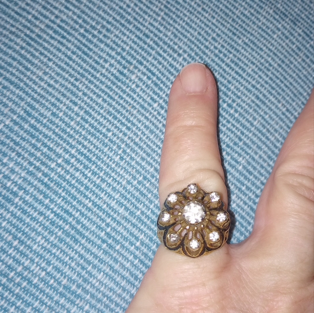 Goldtone Black enamel and clear pronged stones open metal work